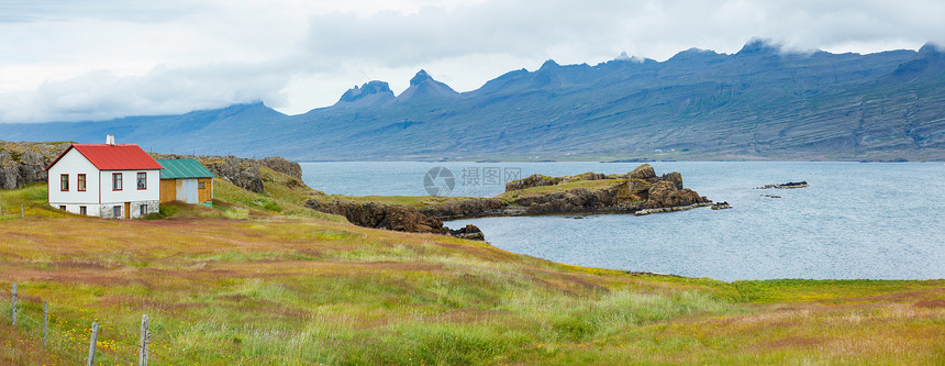冰岛美丽的风景国家爬坡场景港口天空海岸线峡湾全景干草海洋图片