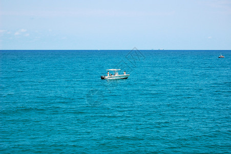 佛罗里达州木星海洋地平线渔夫钓鱼背景图片