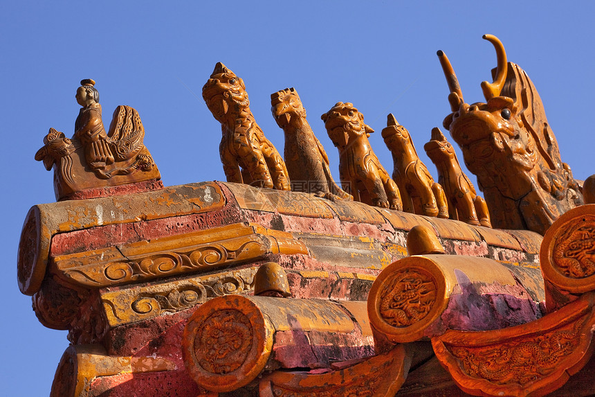 北京紫禁城宫北京 黄屋顶建筑红色雕像城市文化纪念碑历史地标黄色图片