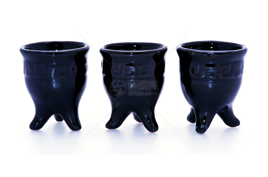 白色背景的黑茶杯中国人制品陶瓷黑色水平杯子仪式情调文化异国服务图片