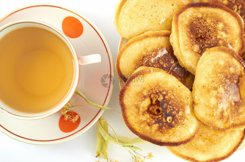 煎饼早餐杯子植物飞碟蜂蜜茶具食物制品面粉饮料图片