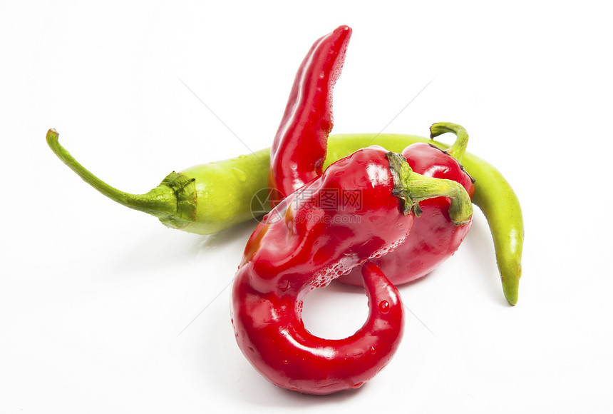 红辣椒和绿辣椒胡椒小吃红色美食白色作品辣椒食物蔬菜绿色营养图片