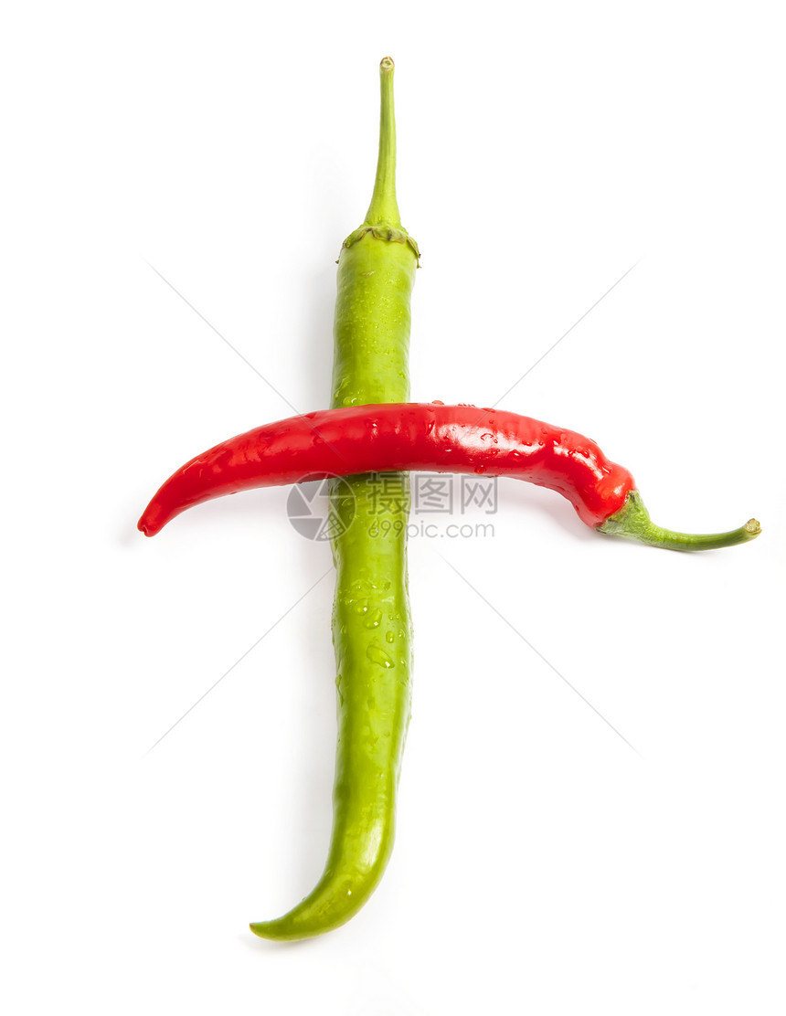 红辣椒和绿胡椒 以十字形状图片