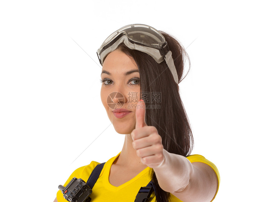 一名女性建筑工人持有信号 与外界隔绝职业反光衣领安全帽就业警告对讲机女孩工人帽子图片