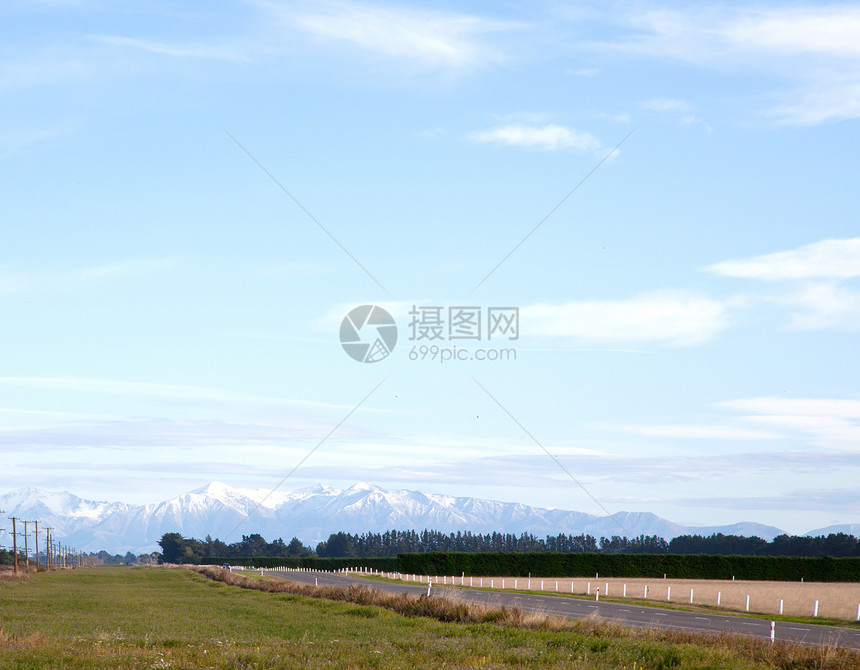 漫长的道路延伸高度风景岩石沙漠高地驾驶旅行沥青登山旅游图片