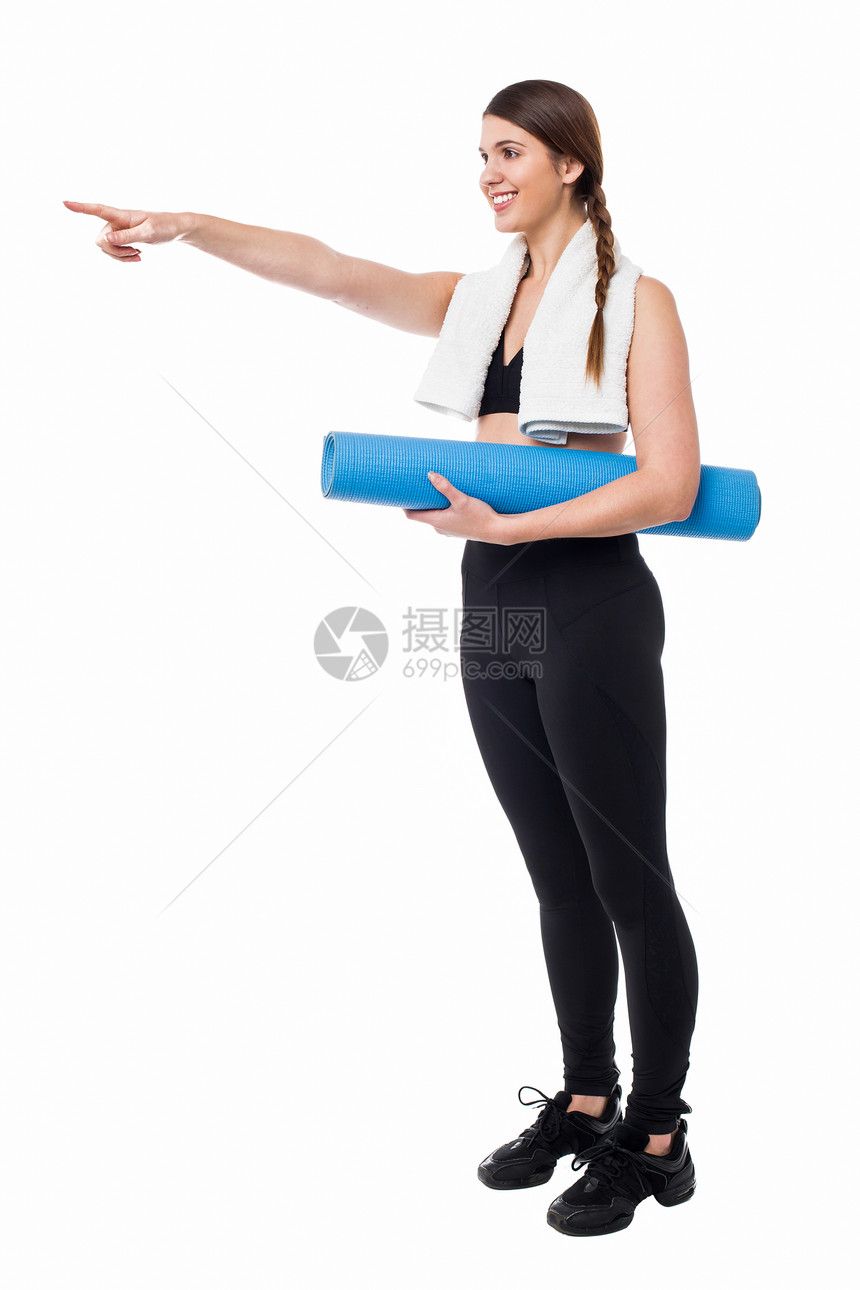 漂亮的体操女郎向前指运动毛巾工作室女孩闲暇女士瑜伽冒充运动装手指图片