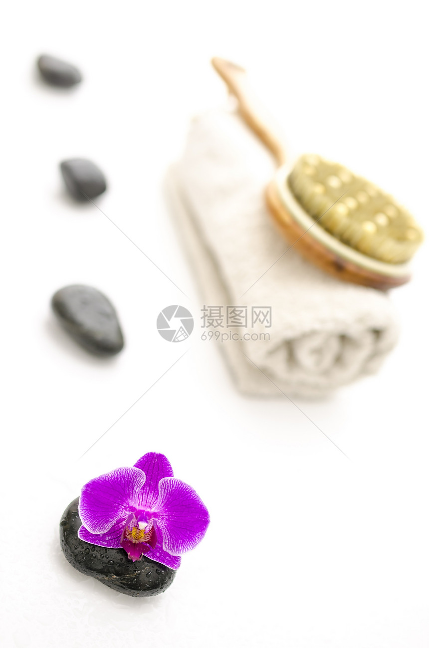 带有粉红兰花的spa 设置图片