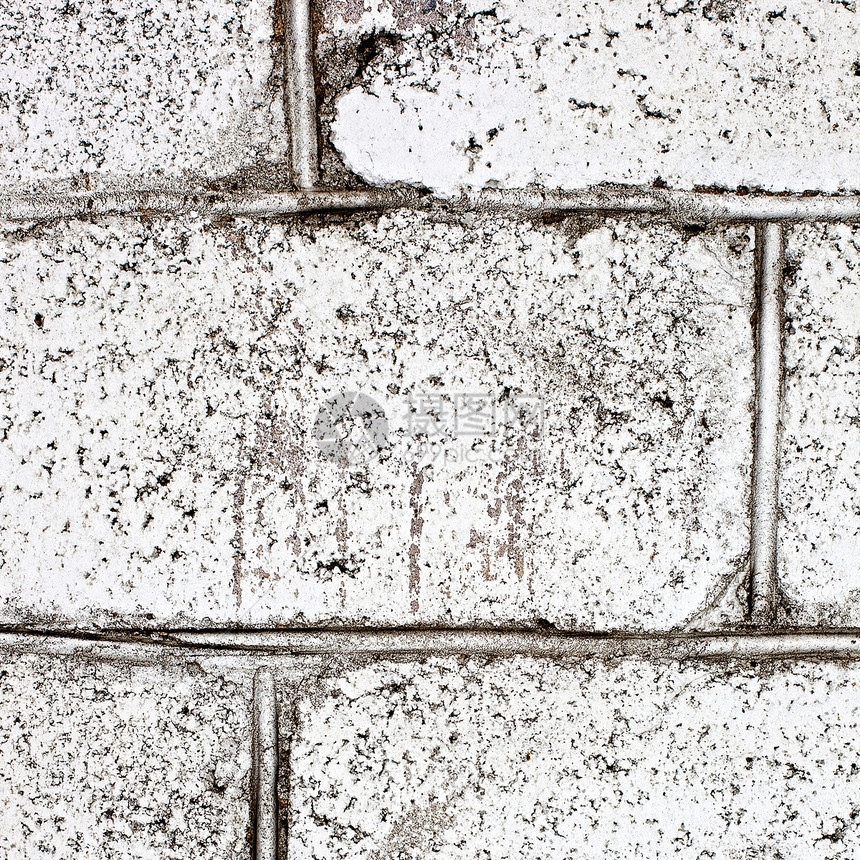 白砖的复古墙柜台矿物平板建筑学艺术黑色地质学墙纸石头水泥图片
