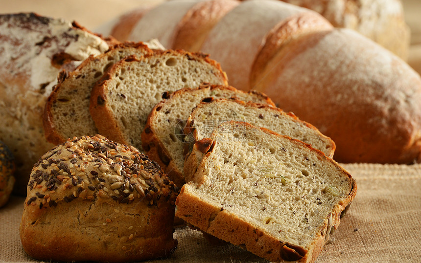 含有面包和卷饼的成分食物粮食玉米向日葵什锦烘烤养分谷物购物大麦图片