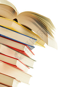 白色背景上孤立的书堆堆科学字典知识教育学习哲学阅读精装学校背景图片
