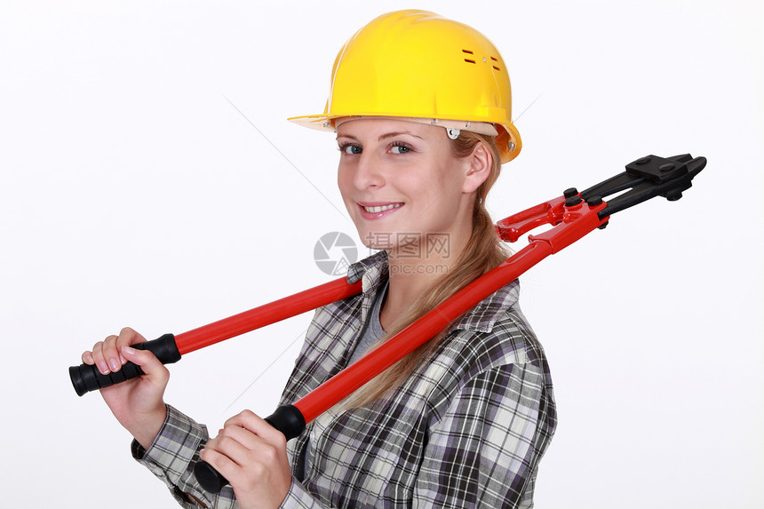 配有螺栓管的妇女女性化笑脸螺栓工作室安全帽姑娘女性工具工人女士图片