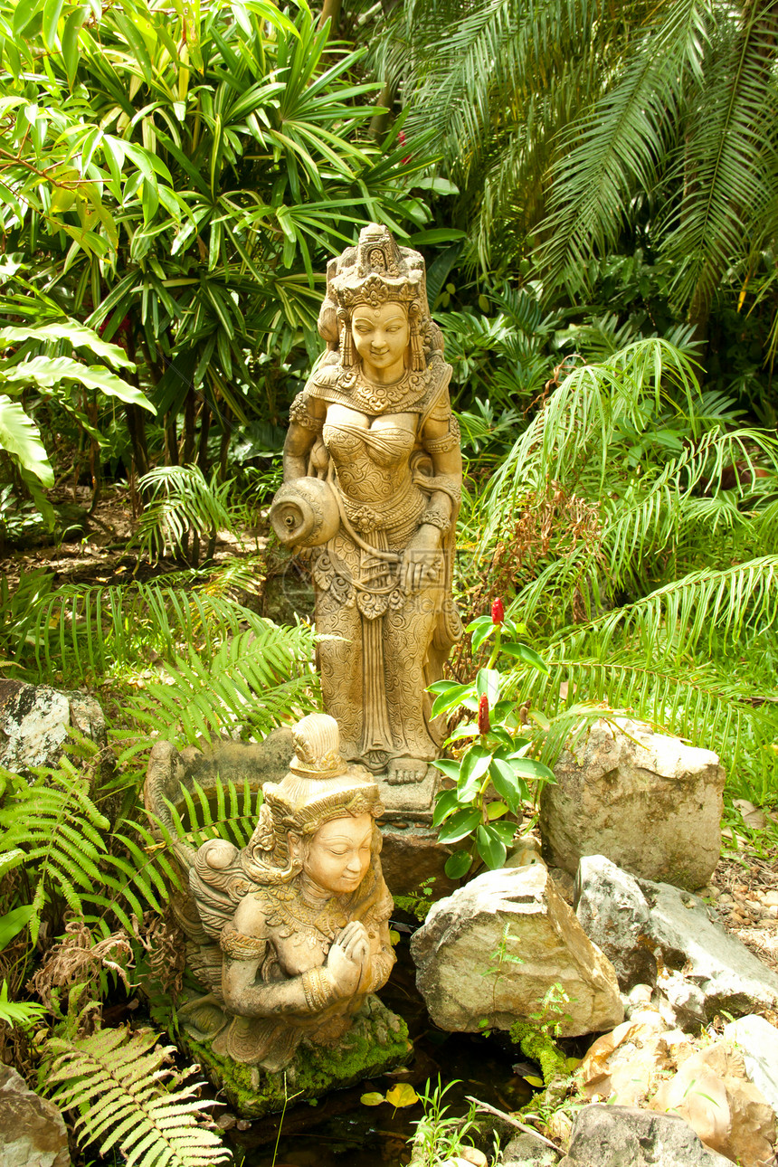 女人的雕像艺术裙子植物群花园古玩古董文学黄色展示管道图片