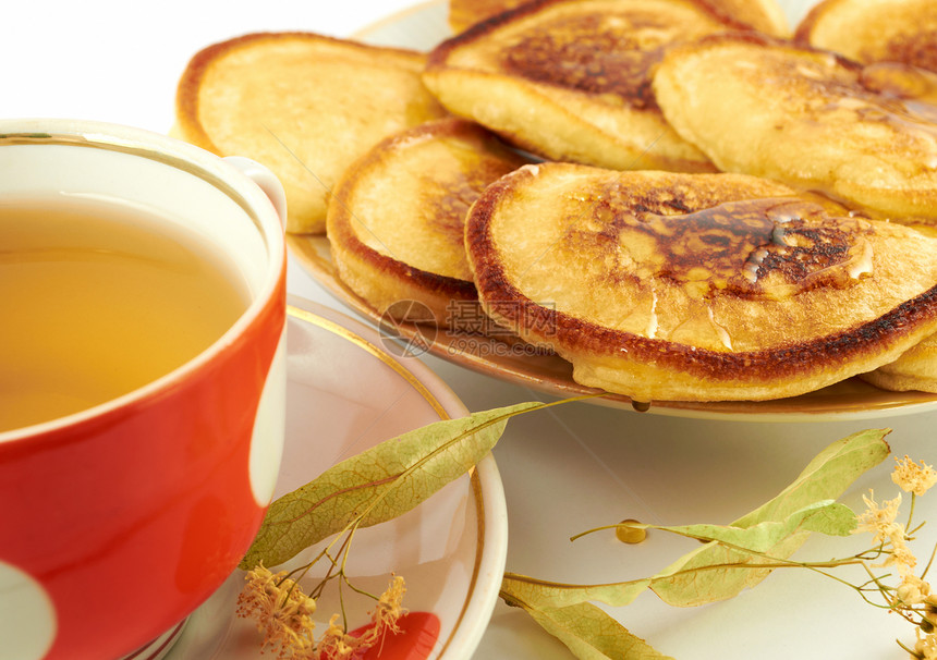 煎饼甜点蜂蜜飞碟茶具植物杯子食物油炸早餐面粉图片