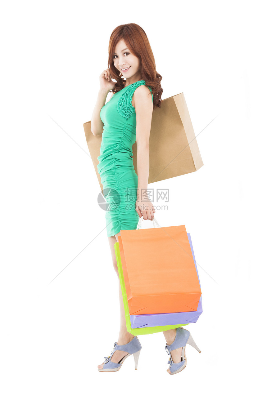 满身笑容的亚洲女人拿着购物袋微笑顾客快乐享受女性乐趣销售女孩购物礼物图片