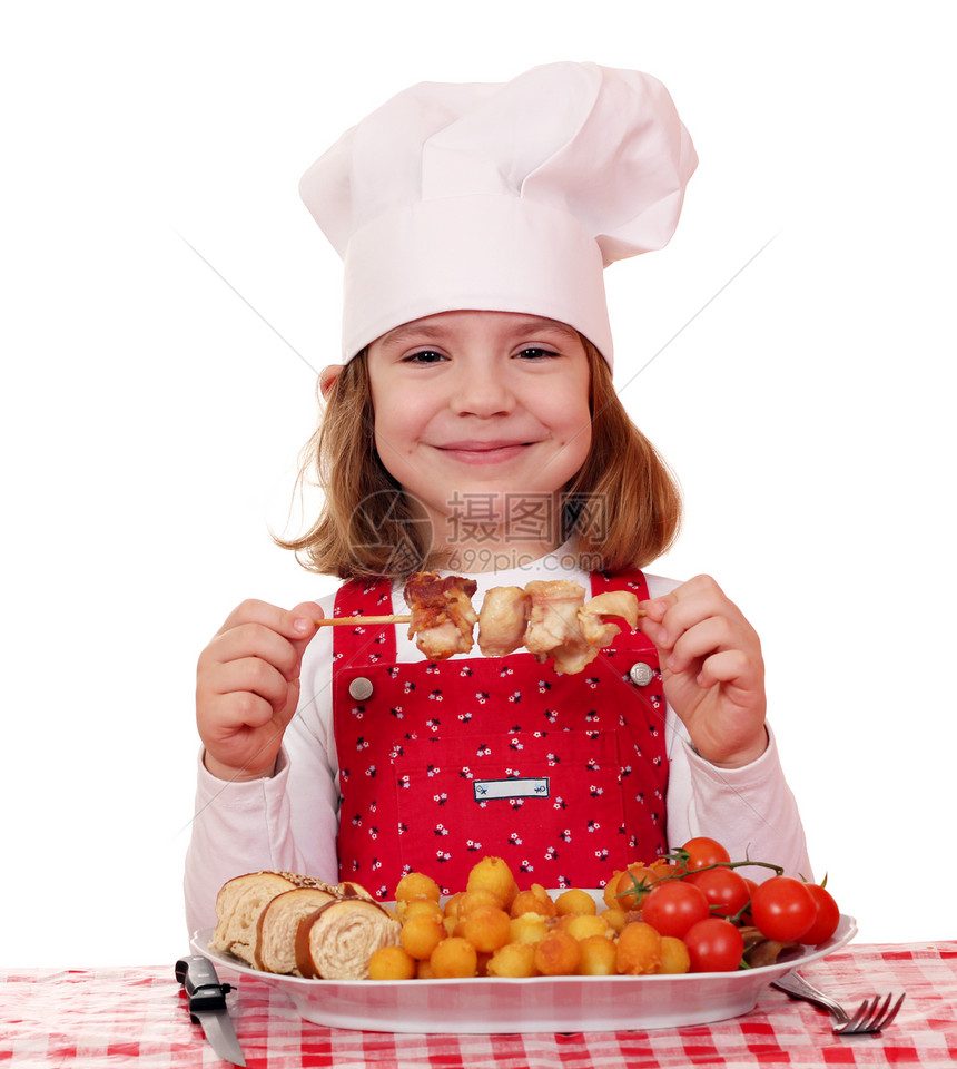 做饭的小女孩吃烤鸡肉图片