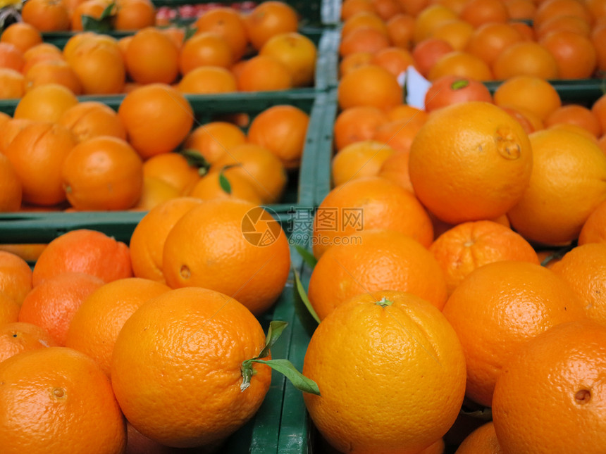 市场上的新鲜橙子水果店铺生产墙纸团体植物销售农民农场果汁图片