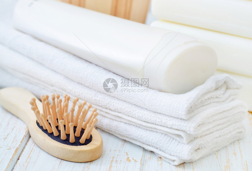 毛巾和洗发水蓝色凝胶奶油产品身体吸收兰花洗剂清洁度润肤图片