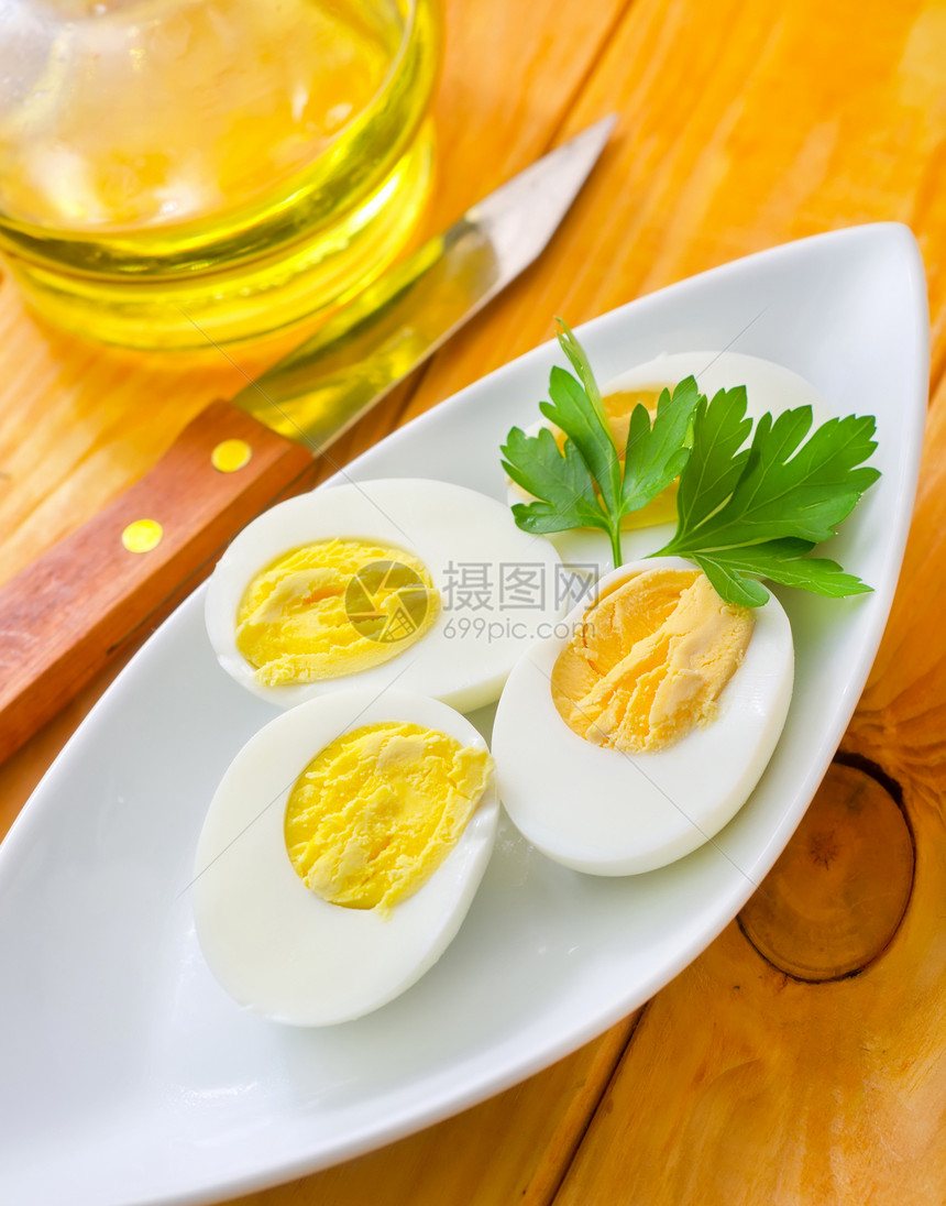 煮鸡蛋白色盘子用餐烹饪摄影沙拉蛋黄美食绿色黄色图片