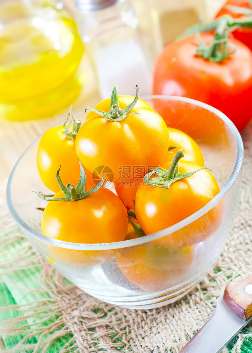 玻璃碗中的黄黄番茄团体维生素蔬菜水果西红柿宏观胎儿工作室食物桌子图片