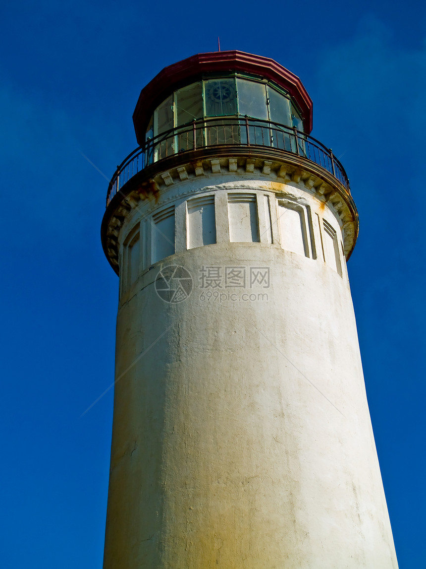 俄勒冈海岸北头灯塔晴天海岸石头海岸线安全港口房子保险海景信仰图片