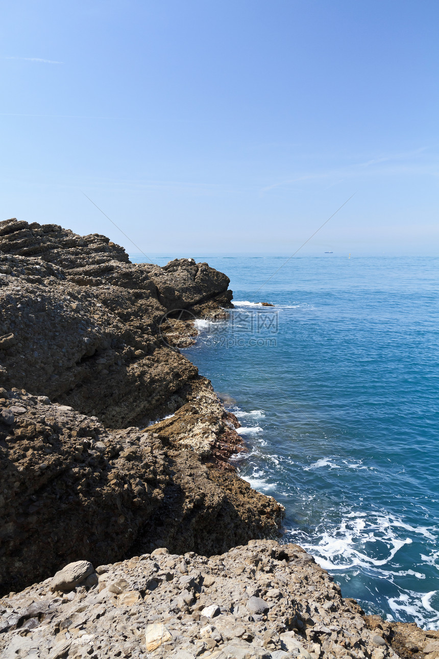 意大利利古里亚悬崖岩石沿海海洋海岸荒野半岛蓝色天空地平线图片