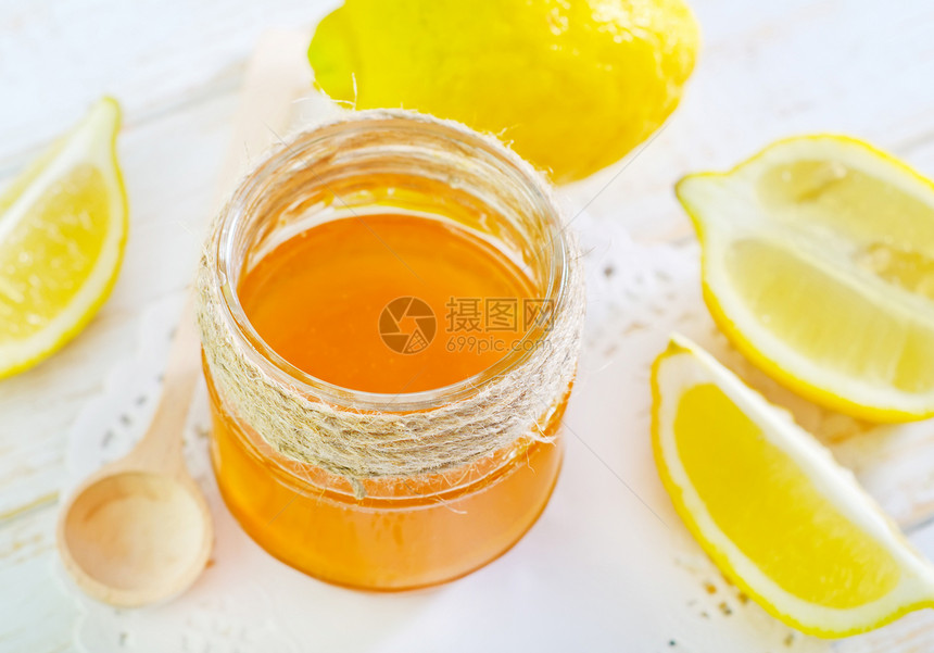 蜂蜜加柠檬早餐营养镜子生产玻璃治愈木头食物产品液体图片