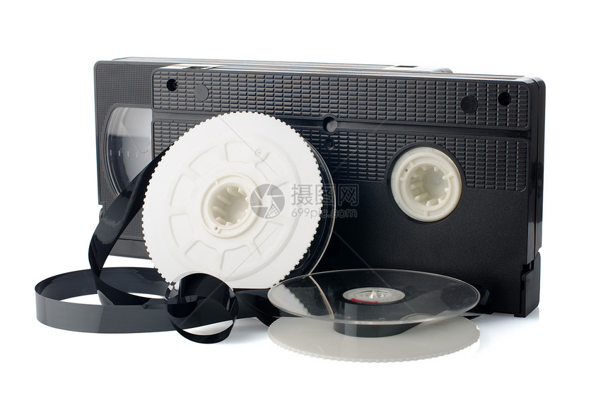 两盘录影带和胶卷贮存视频技术数据光盘录像机录像带白色电影磁带图片