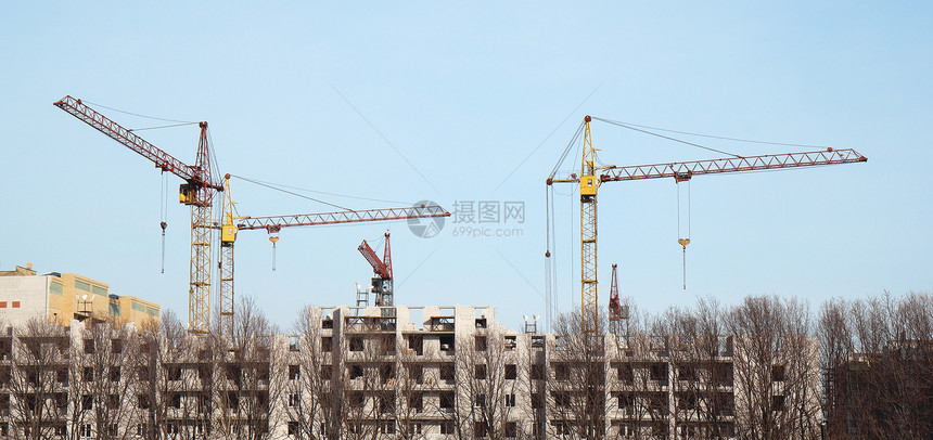 许多正在建造的高楼和Cran大楼的内置建筑纪念碑财产木板石头脚手架建筑学办公室商业进步巨石图片