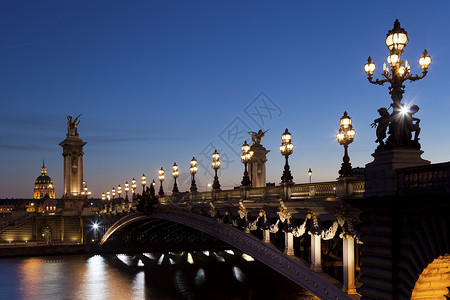 亚历山大三世桥亚历山大三桥 法国巴黎建筑学旅游建筑遗产路灯日落旅行历史性城市照明背景