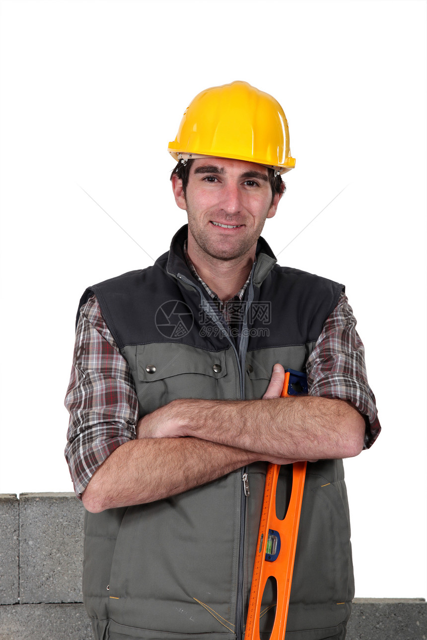 砖层男人建设者房子石匠安全帽商业建筑微笑职场承包商图片