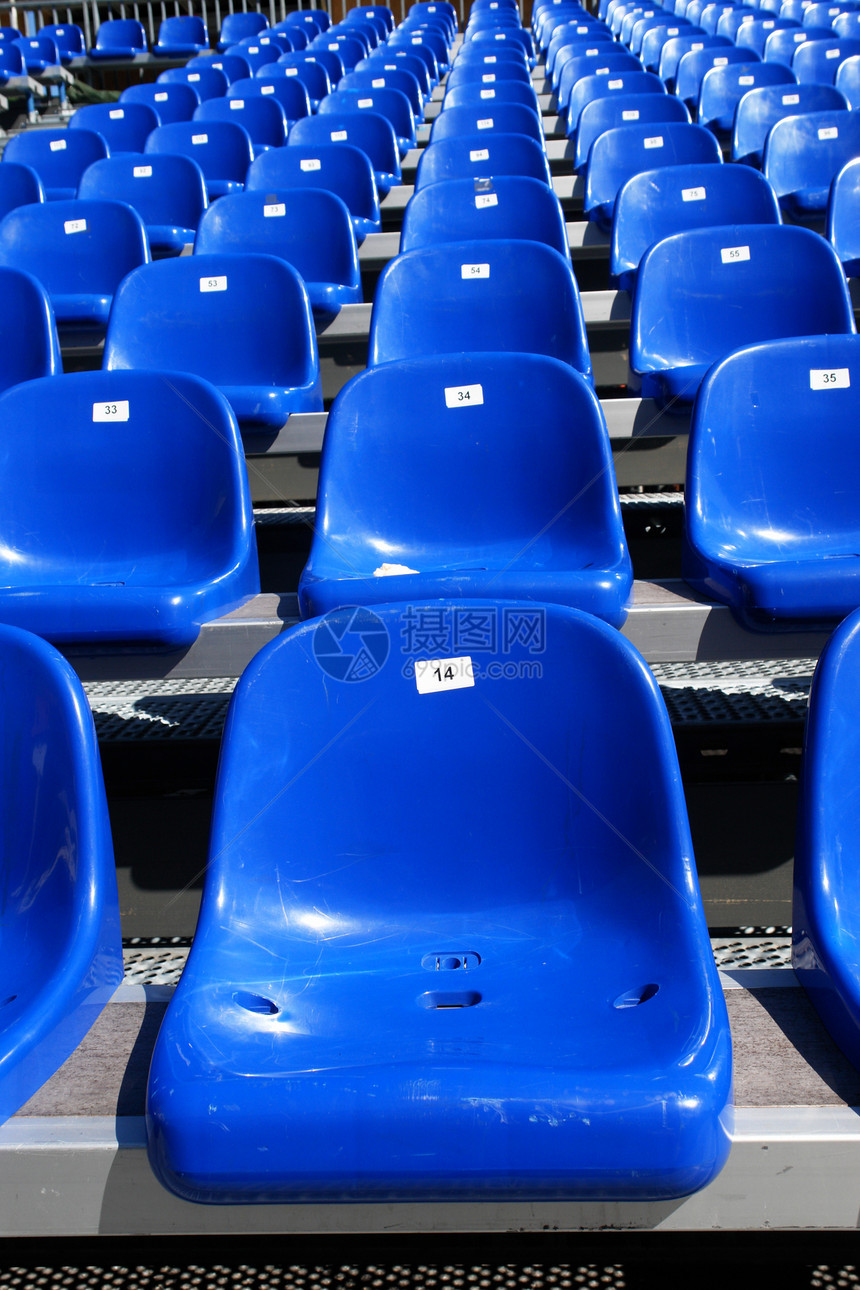 体育场上的蓝席会场走道蓝色民众太阳观众运动竞技游戏锦标赛图片