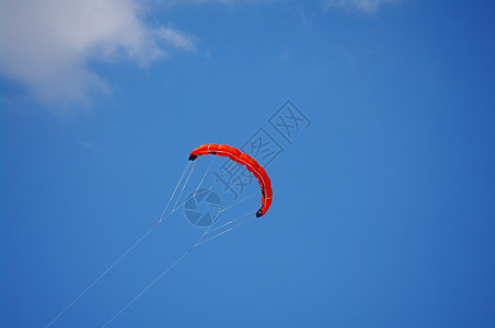 Kite 天空飞翔橙子波浪海滩空气运动享受细绳消遣尾巴力量图片