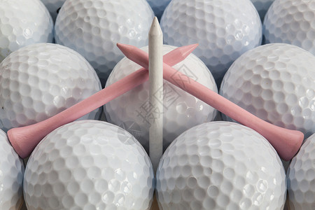 高尔夫球和金球发球台运动静物背景图片