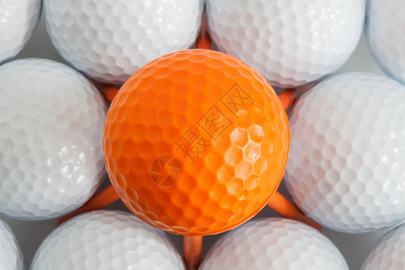 白高尔球对称静物运动背景图片