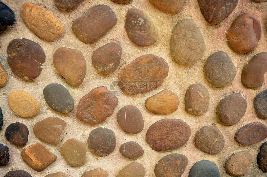 抽象石子圆纹墙图片
