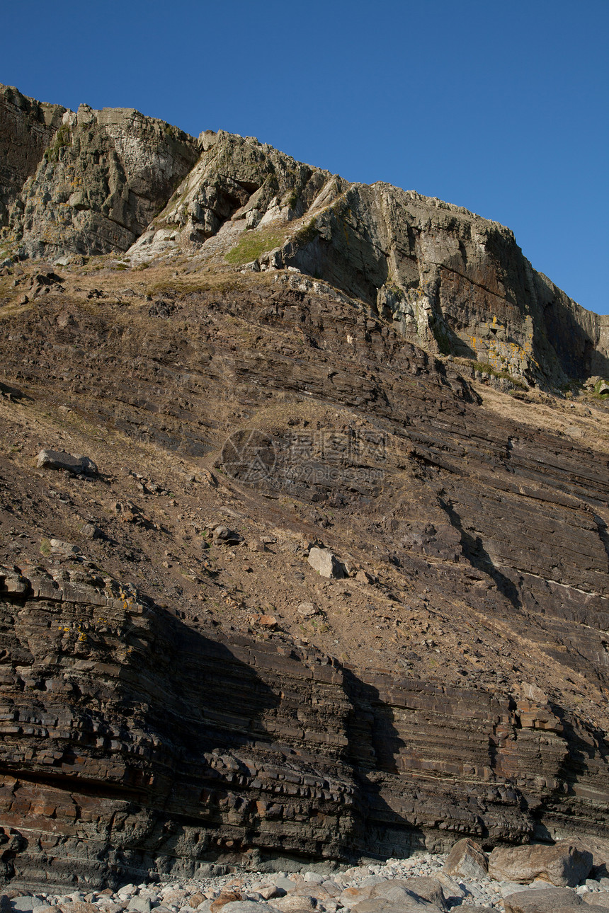 沉积岩层天空鹅卵石地质学图层材料编队碎石蓝色支撑石头图片
