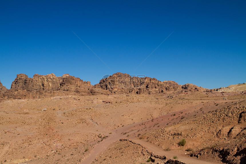 约旦佩特拉的景观建筑学石头历史遗产文化历史性砂岩旅行沙漠金库图片