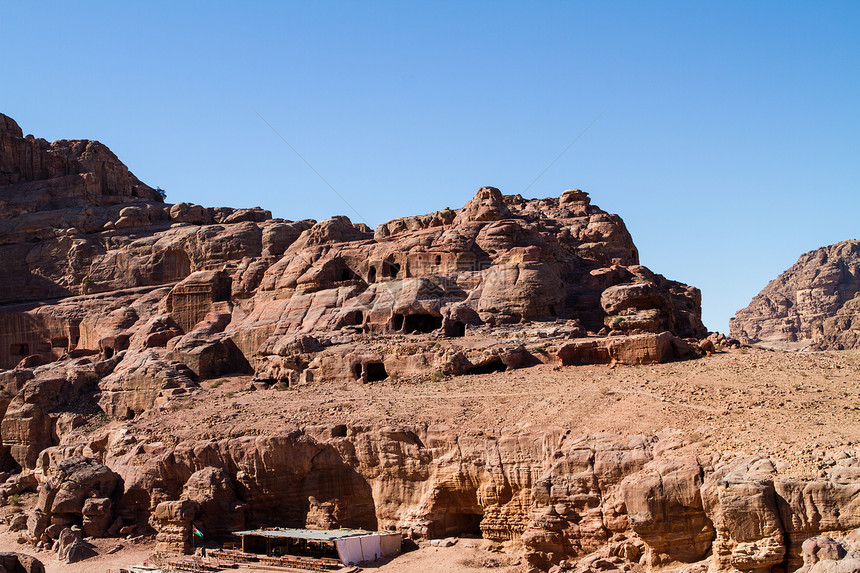 约旦佩特拉的景观砂岩建筑学历史金库红色沙漠宝藏石头旅行岩石图片