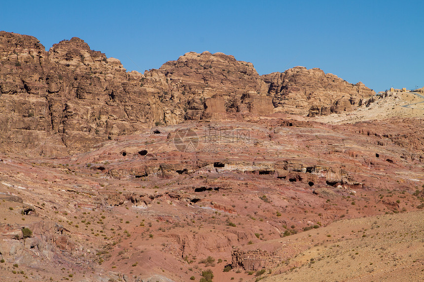 约旦佩特拉的景观雕刻雕塑历史性石头红色岩石文化旅行沙漠宝藏图片