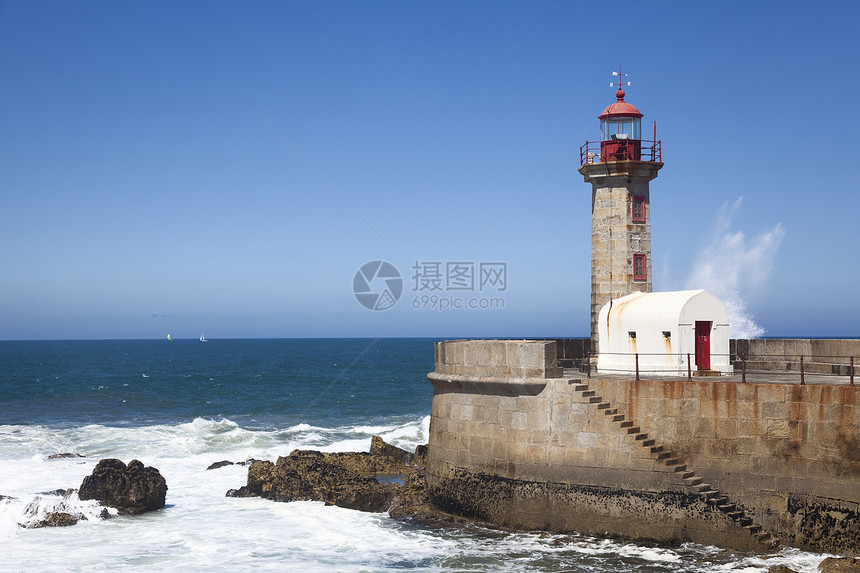 葡萄牙波尔图灯塔旅行城市晴天海洋岩石历史灯塔旅游历史性建筑图片