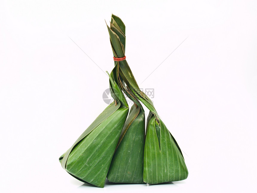 由香蕉叶制作的泰国甜点包白色环境问题椰子蜜饯糖类绿色食物传统叶子包装图片