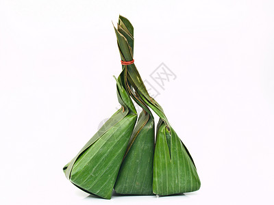 由香蕉叶制作的泰国甜点包白色环境问题椰子蜜饯糖类绿色食物传统叶子包装背景图片