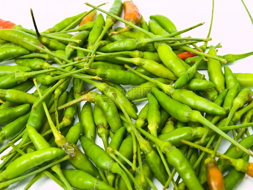 来自泰国的绿鸟眼冷辣椒堆烹饪健康绿色香料胡椒红色草本植物食物辣椒蔬菜图片