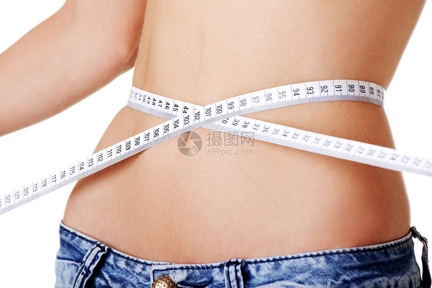 测量腰部的年轻女子身体饮食组织腹部女士女孩腰围减肥牛仔裤橘皮图片