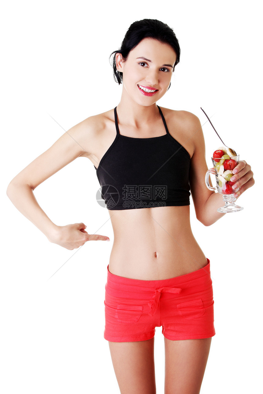 吃水果沙拉的漂亮女人食物早餐损失身体覆盆子成人甜点女孩重量饮食图片