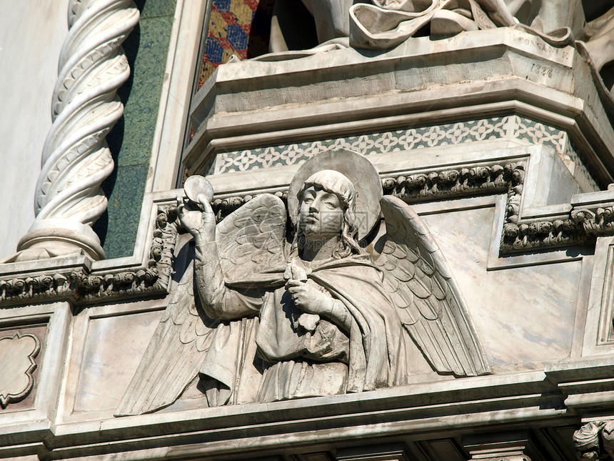 佛罗伦萨设计Duomo外墙入口的装饰大理石门户网站宽慰雕塑建筑学艺术大教堂教会拱廊控制板图片