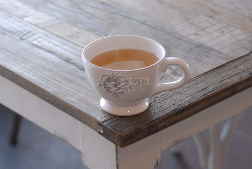 一杯茶白色科普杯子桌子热饮博德冰霜边框图片