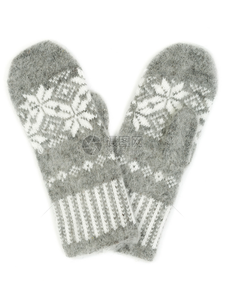 在白色背景上分离的灰色针织手套图片