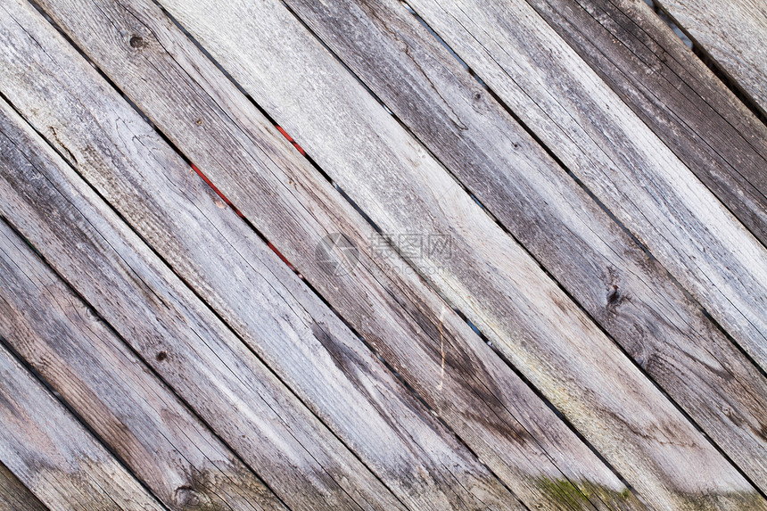 木木板背景的图像对角线硬木木头控制板桌子材料风化地面木材条纹图片