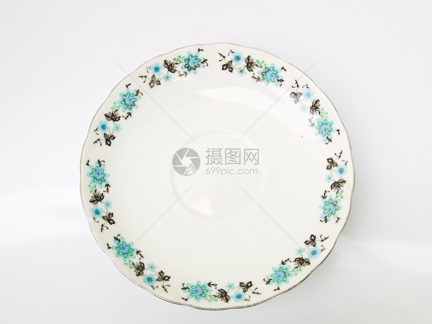 白色背景上孤立的花岗茶杯草本玻璃时间杯子液体早餐饮料棕色花朵盘子图片